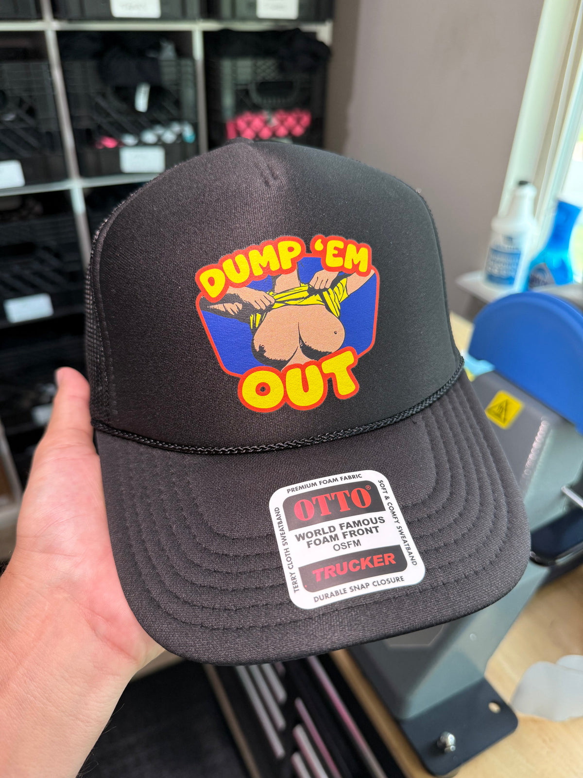 Dump Em Out Trucker Hat