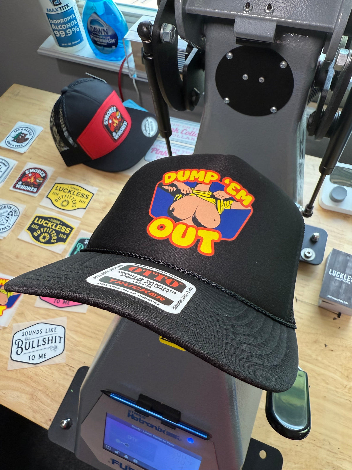 Dump Em Out Trucker Hat